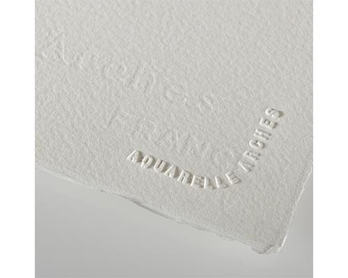 A corner of watercolor paper with the Arches company watermark